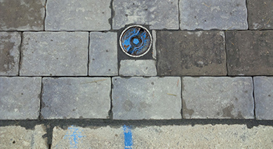 Water shut-off valve in a driveway location